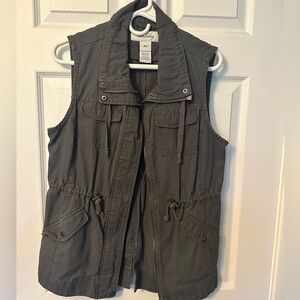 Medium grey fashion vest with zipper, and pockets